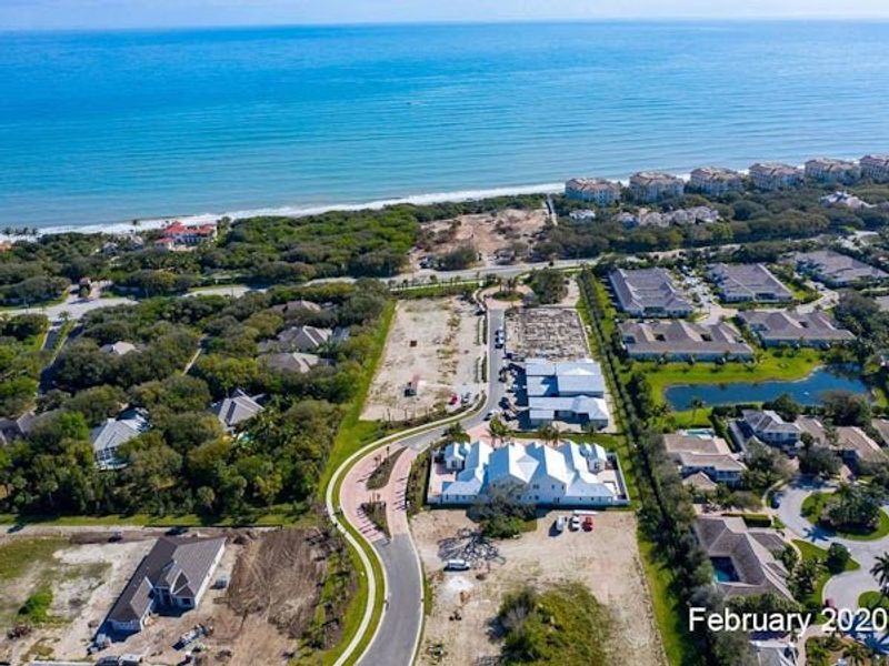 Aerial view of the The Strand community in Vero Beach, FL, showing layout and nearby surroundings (Image 64).