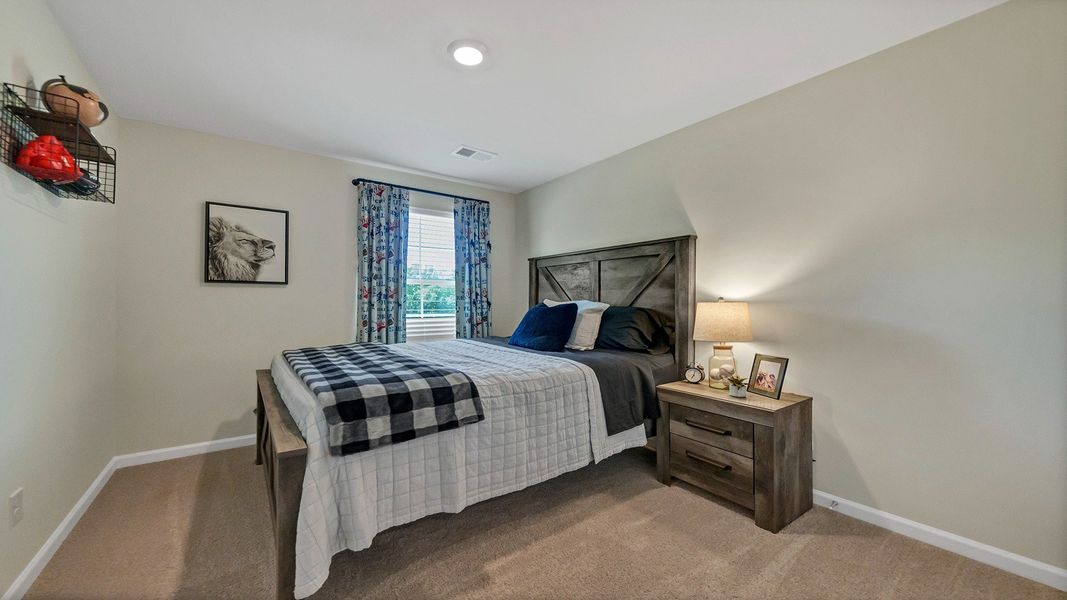 Furnished interior in a model home at Hunter's Branch Townhomes in Hopkins (Image 18).