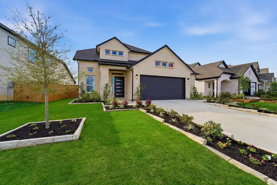 Front exterior of a home in the Wildrye community, located in Waller, TX (Image 3).