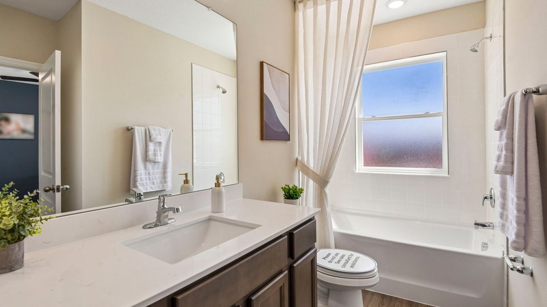 Furnished interior in a model home at Sanctuary at Citrus Park Townhomes in Tampa (Image 25).