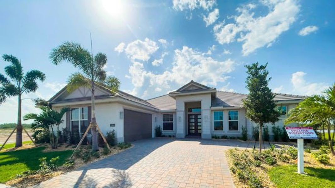 Front exterior of a home in the BELTERRA community, located in Port St. Lucie, FL (Image 61).