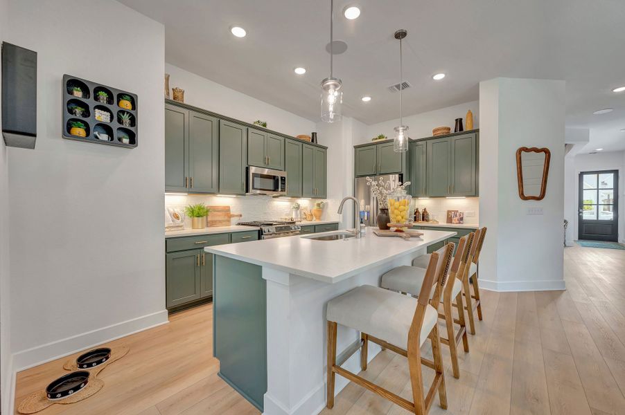 Furnished interior in a model home at Kissing Tree – Grove Series in San Marcos (Image 7).
