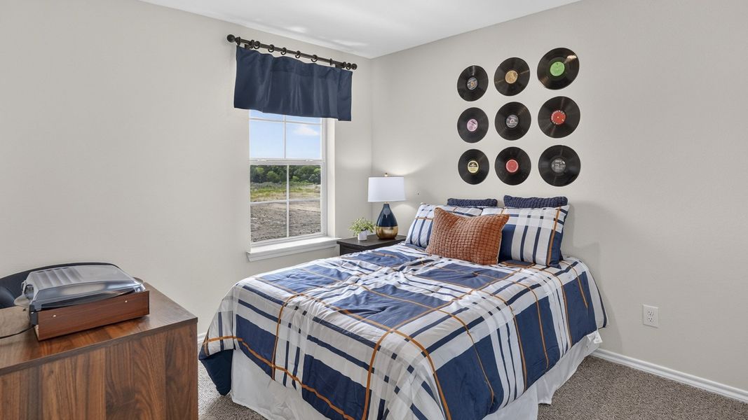 Furnished interior in a model home at Crane Crossing in Crandall (Image 7). Furnished interior in a model home at Crane Crossing in Crandall (Image 7).