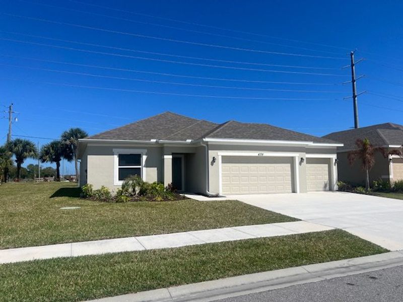 Front exterior of a home in the Lakes At St Sebastian community, located in Sebastian, FL (Image 12).