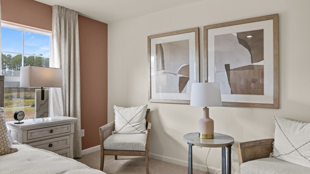 Furnished interior in a model home at Oakchase at Hampton in Hampton (Image 19).