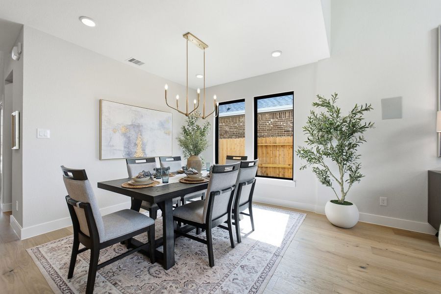 Furnished interior in a model home at Grand Magnolia in Waller (Image 8).