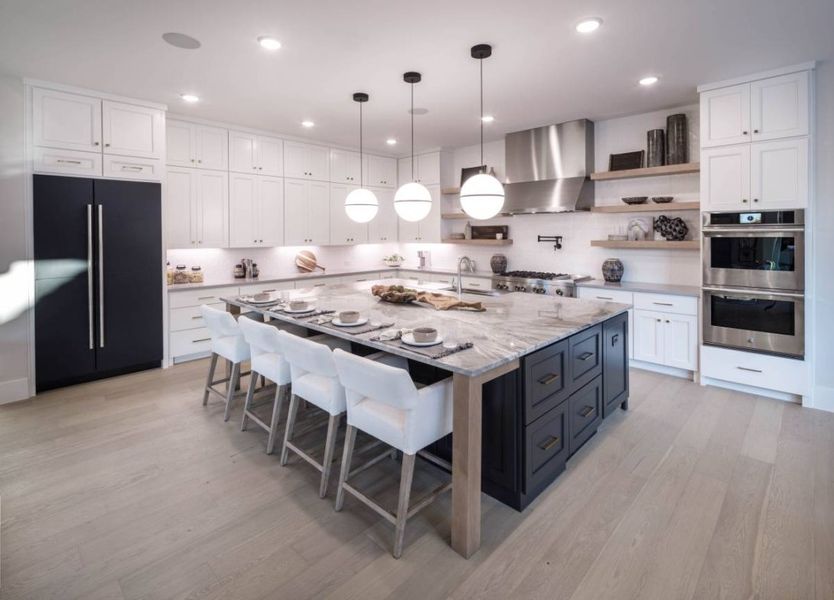 Furnished interior in a model home at Windsong Ranch in Prosper (Image 10).