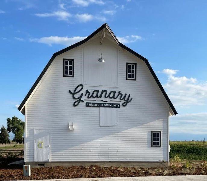 Entrance to the Granary Trailblazer Collection - Single Family Homes community in Johnstown, CO, featuring signage and landscaping (Image 12). Entrance to the Granary Trailblazer Collection - Single Family Homes community in Johnstown, CO, featuring signage and landscaping (Image 12).