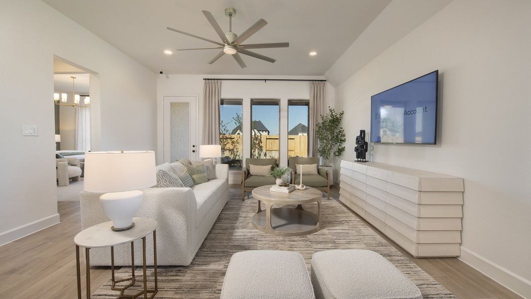 Furnished interior in a model home at Cross Creek West 45' in Fulshear (Image 10).