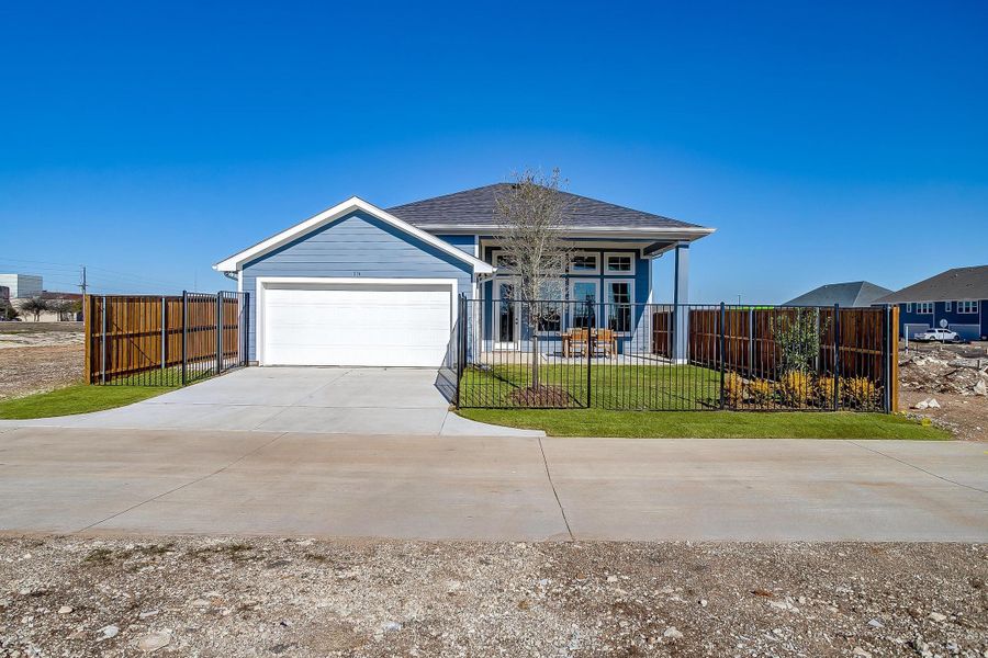 Front exterior of a home in the MidTowne community, located in Midlothian, TX (Image 10).