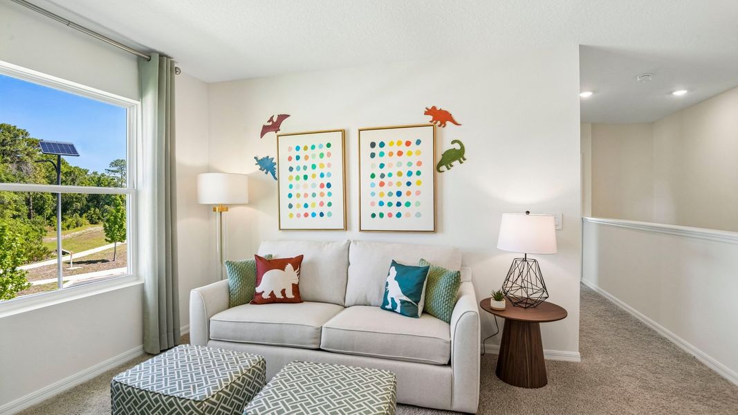 Furnished interior in a model home at Sanctuary at Citrus Park Townhomes in Tampa (Image 19).