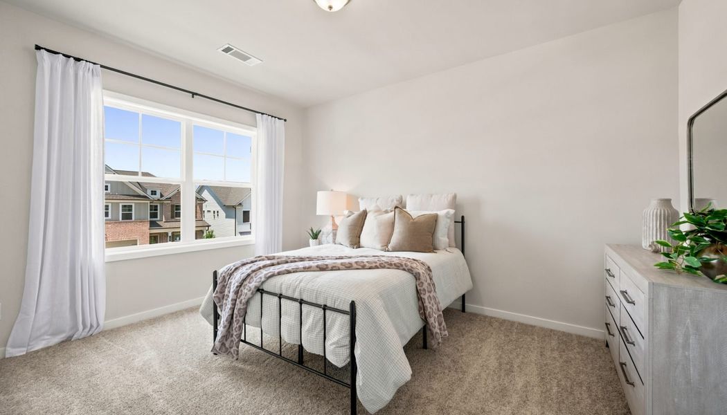 Furnished interior in a model home at Fowler Farms in Auburn (Image 104).