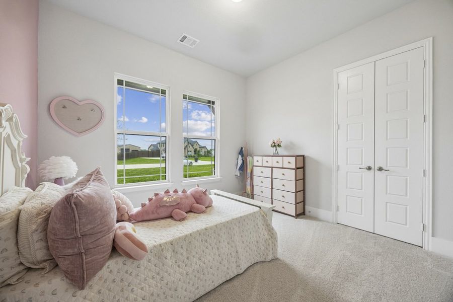 Furnished interior in a model home at Coppenger Place in Godley (Image 49).