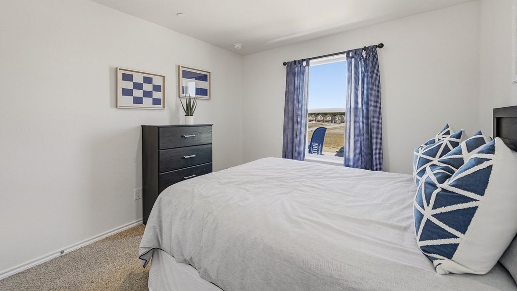 Furnished interior in a model home at Arbor Trails South in Princeton (Image 18).