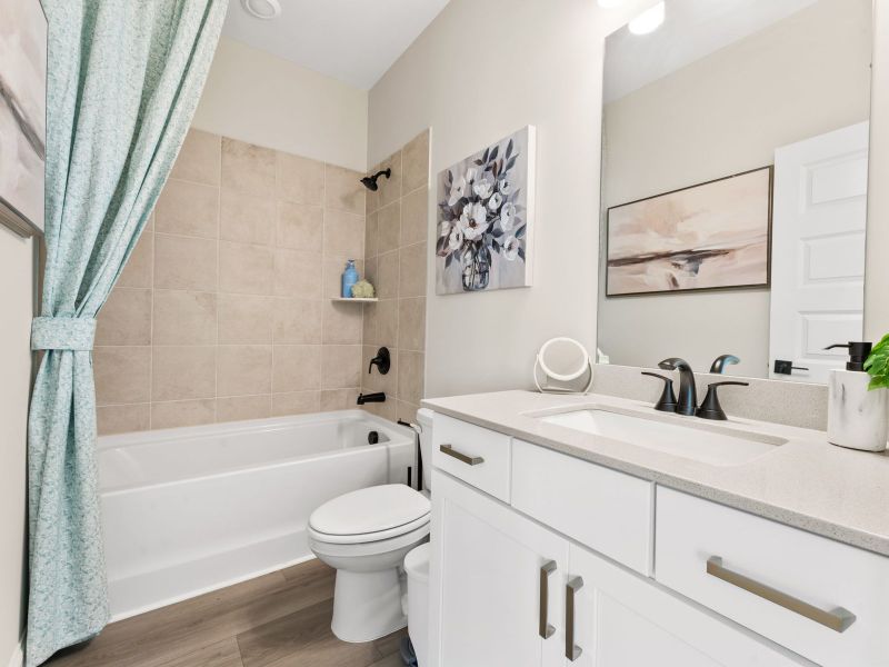 Furnished interior in a model home at Hemingway - Highland Series in Cumming (Image 22).