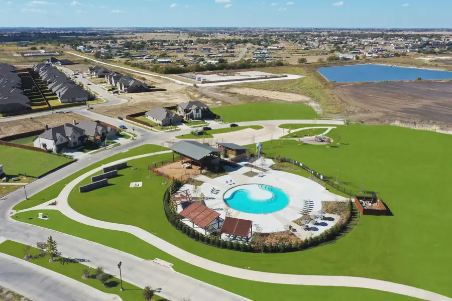 Aerial view of the Silo Mills community in Joshua, TX, showing layout and nearby surroundings (Image 1). Aerial view of the Silo Mills community in Joshua, TX, showing layout and nearby surroundings (Image 1).