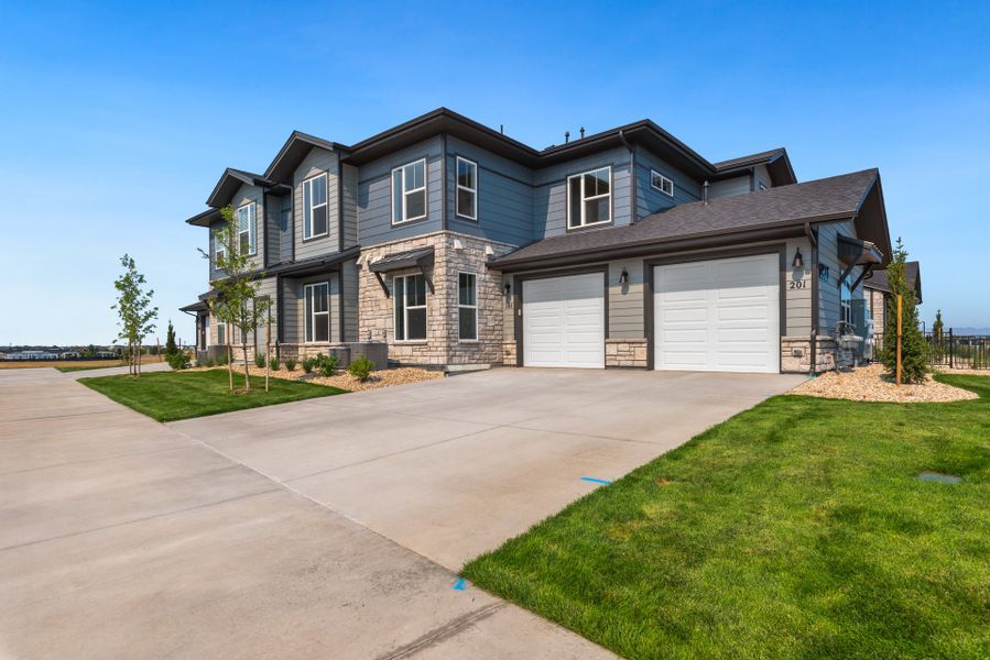 Front exterior of a home in the Wilder at Timnath Ranch community, located in Timnath, CO (Image 17).