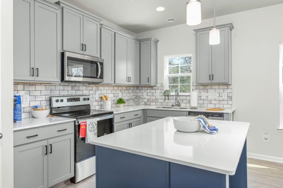 Furnished interior in a model home at The Wilcox in Greensboro (Image 51).