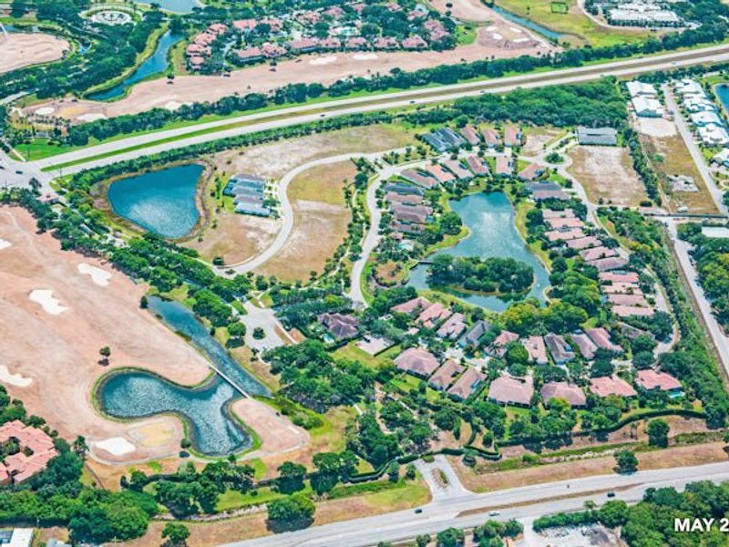 Aerial view of the The Falls at Grand Harbor community in Vero Beach, FL, showing layout and nearby surroundings (Image 27).