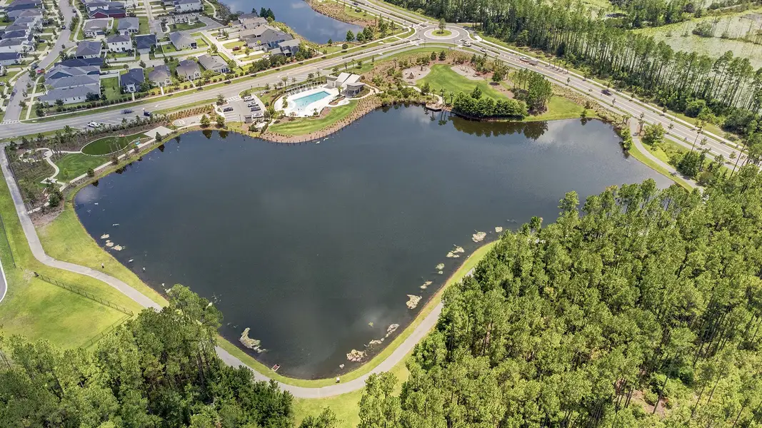 Aerial view of the Westerly Park at Wildlight - Courtyard Collection community in Yulee, FL, showing layout and nearby surroundings (Image 7). Aerial view of the Westerly Park at Wildlight - Courtyard Collection community in Yulee, FL, showing layout and nearby surroundings (Image 7).