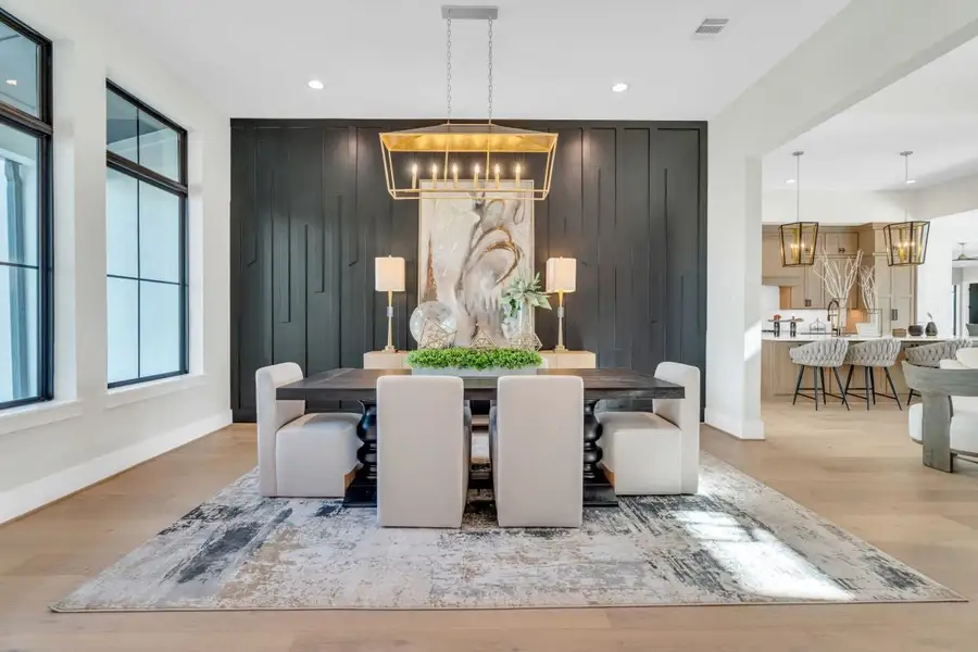 Furnished interior in a model home at Sienna in Missouri City (Image 3).