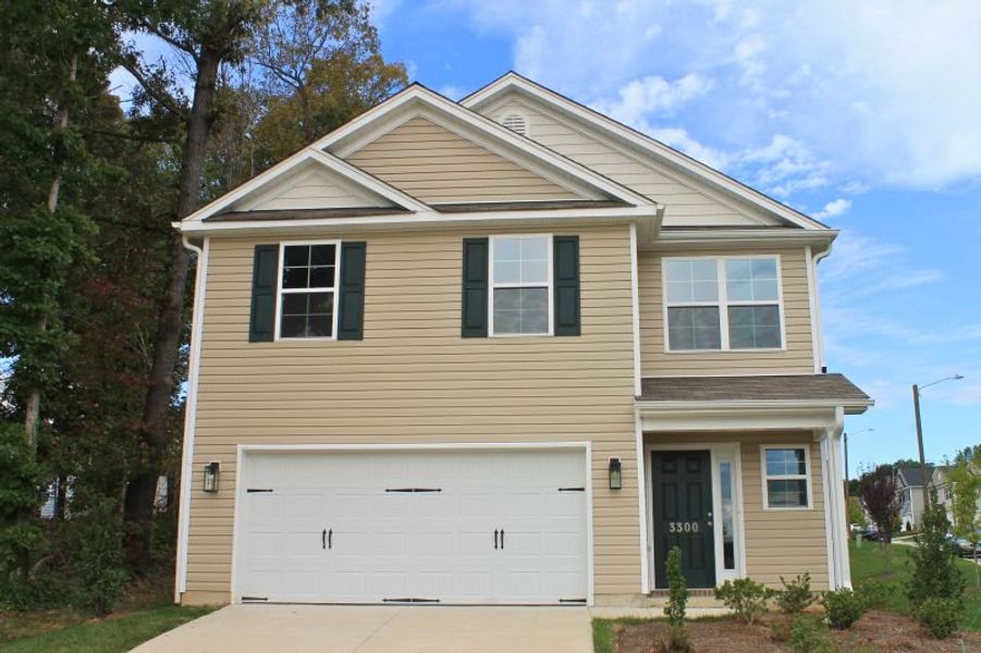 Front exterior of a home in the The Wilcox community, located in Greensboro, NC (Image 19).