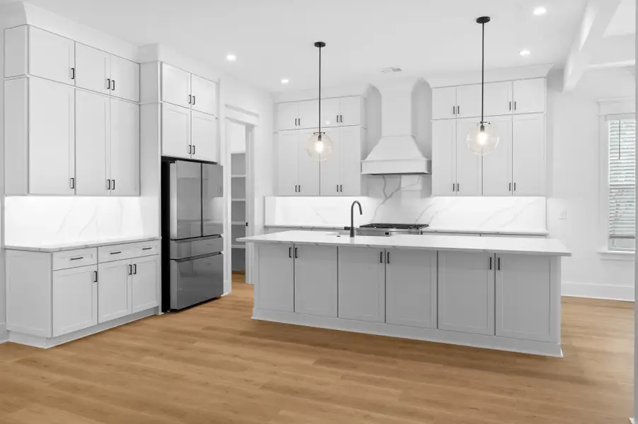 Furnished interior in a model home at Ferryboat Landing in Charleston (Image 5).