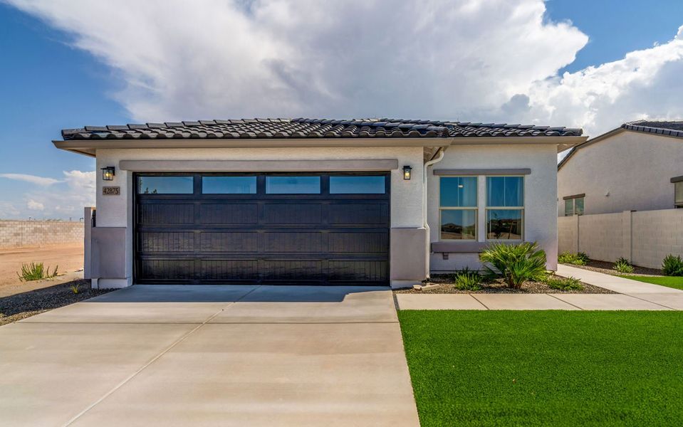 Front exterior of a home in the Rancho Santa Rosa community, located in Maricopa, AZ (Image 10).
