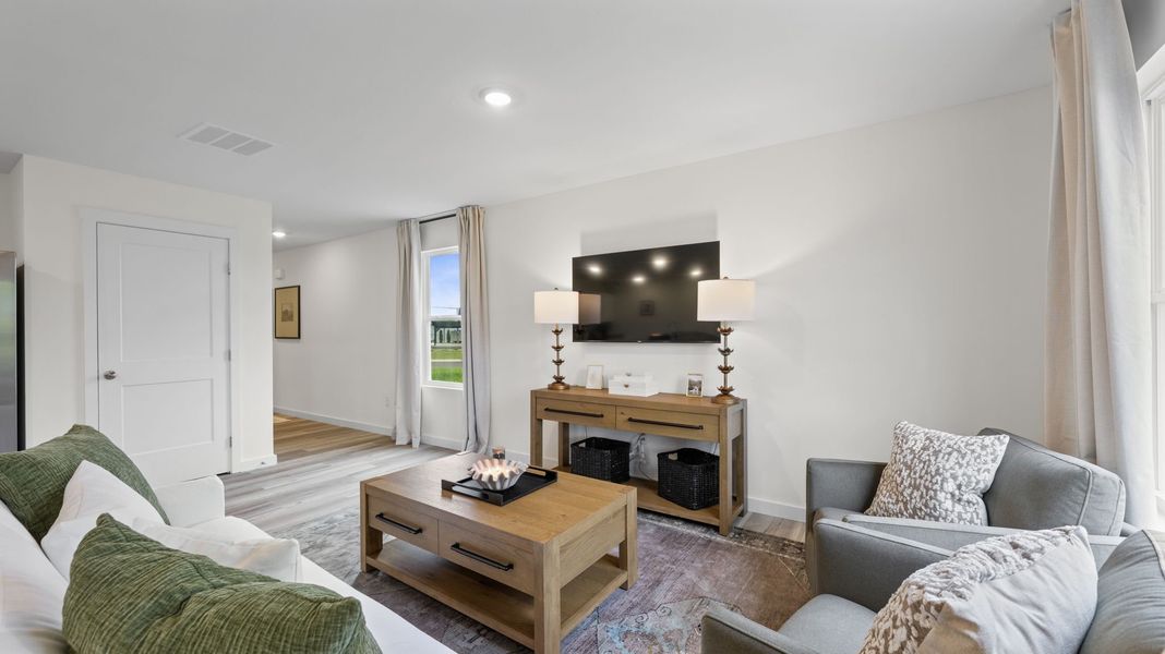 Furnished interior in a model home at Owensby Farms Townhomes in Dayton (Image 13).