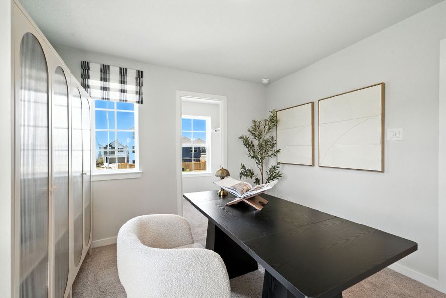 A room with a table and chairs. A room with a table and chairs.