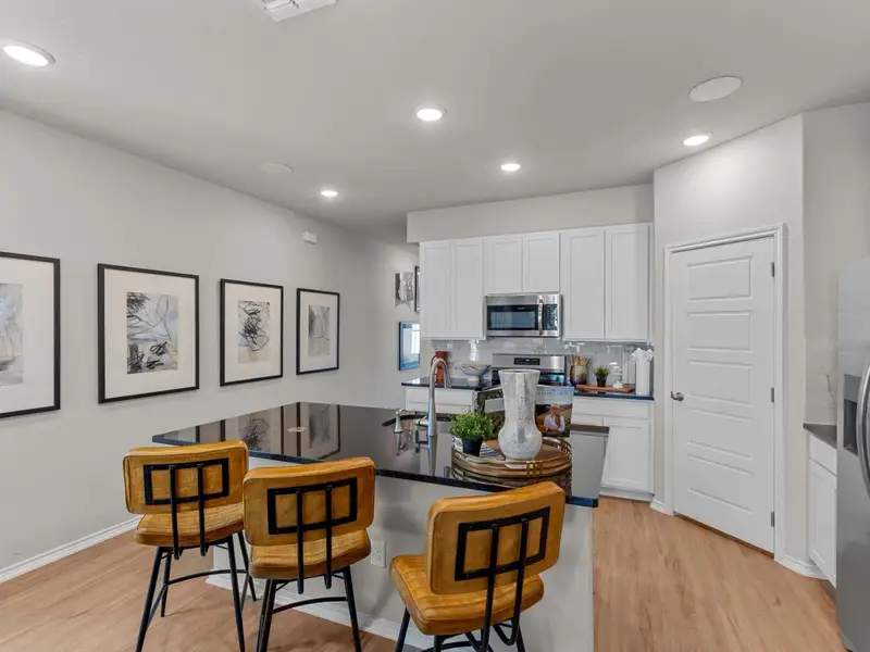 Furnished interior in a model home at Applewhite Meadows in San Antonio (Image 7).