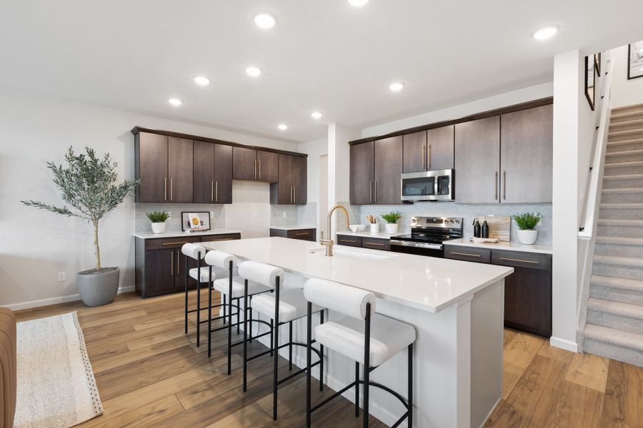 Furnished interior in a model home at Cordovan in Firestone (Image 3).