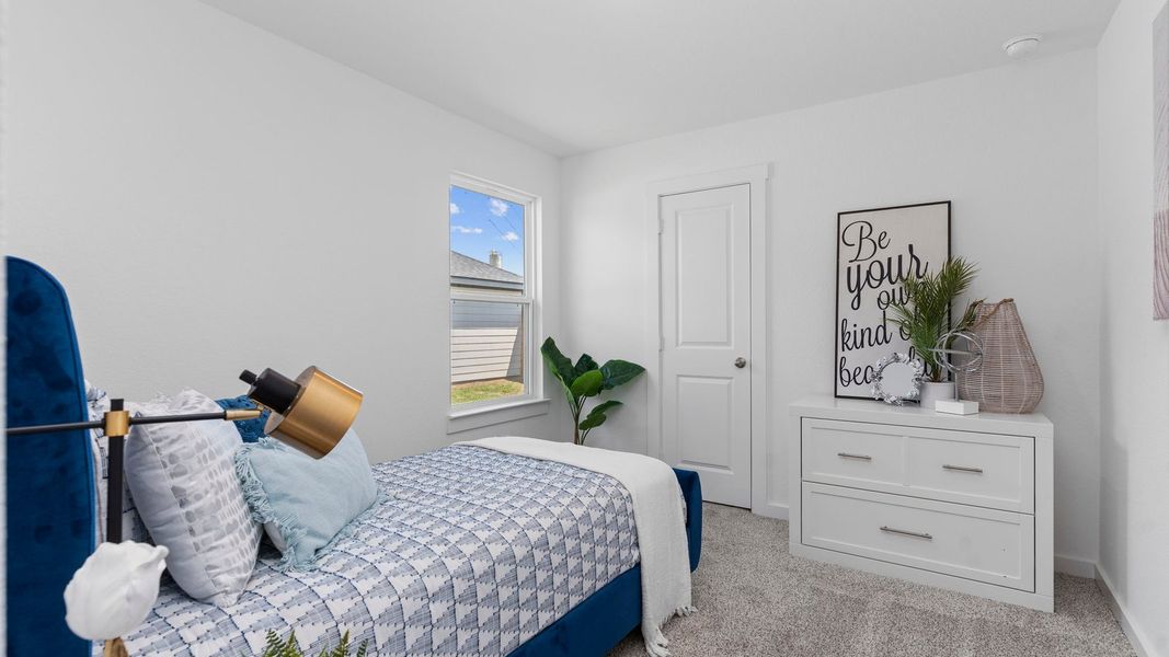 Furnished interior in a model home at August Trails in Needville (Image 7).