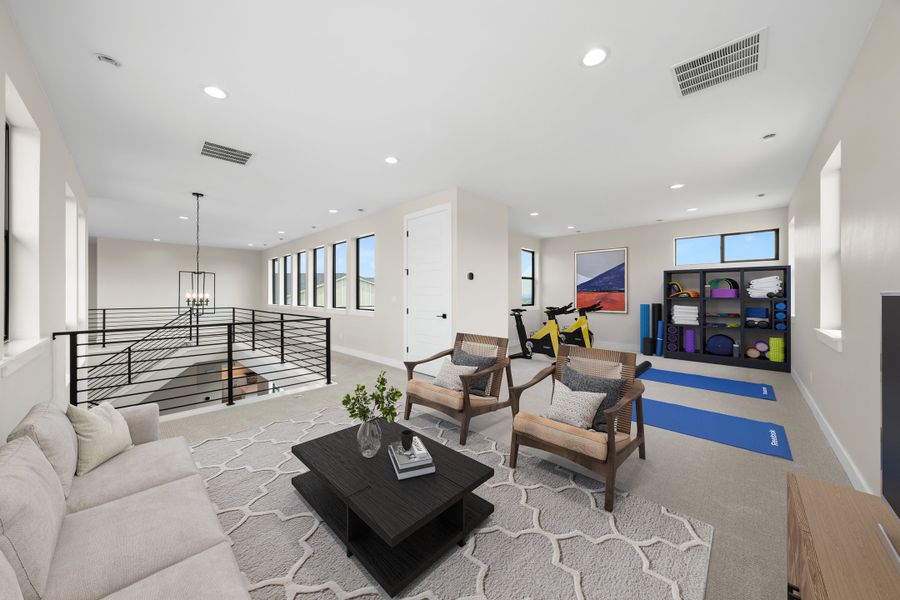 Furnished interior in a model home at The Fairways at RainDance in Windsor (Image 9).