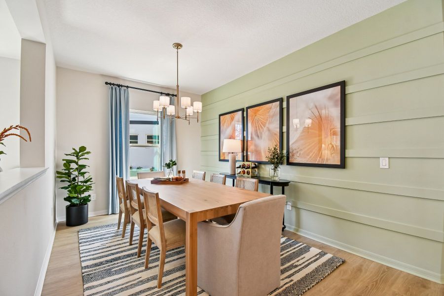 Furnished interior in a model home at Oakfield at Mount Dora Cottage Series in Mount Dora (Image 9).