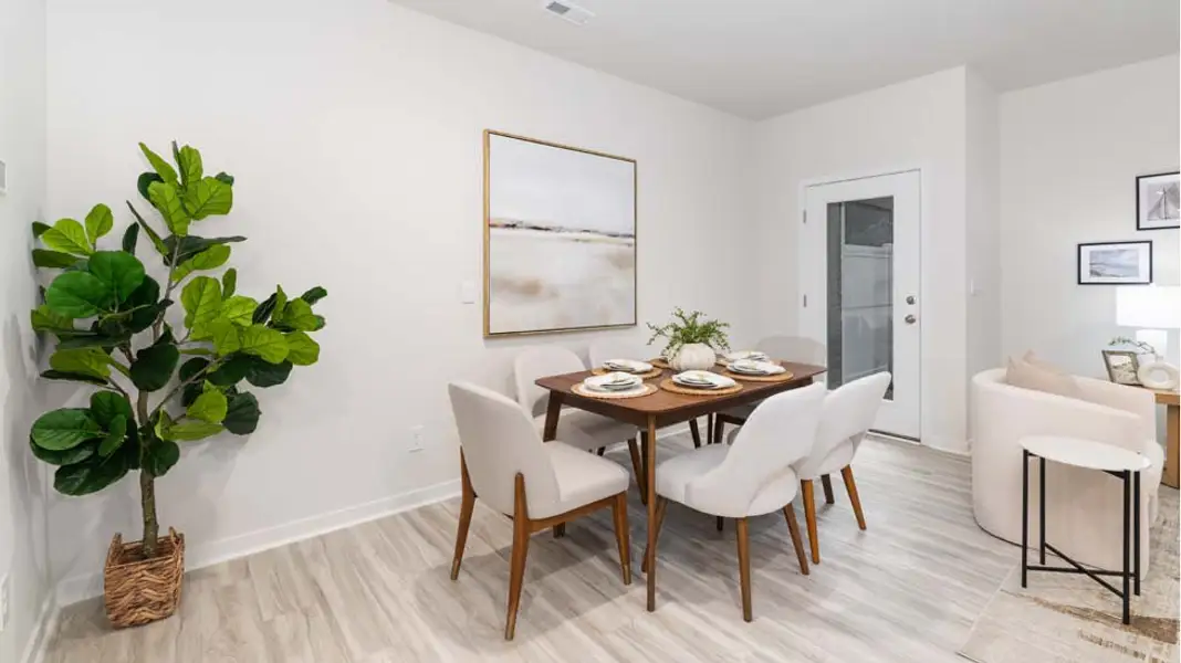 Furnished interior in a model home at The Townes at Troutman in Troutman (Image 5).