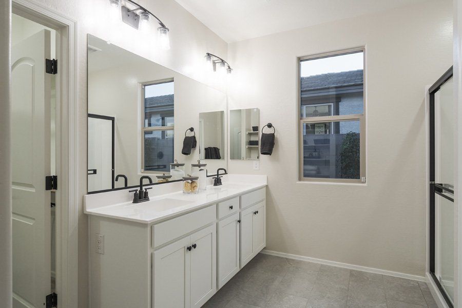 Furnished interior in a model home at Windrose V in Waddell (Image 44).