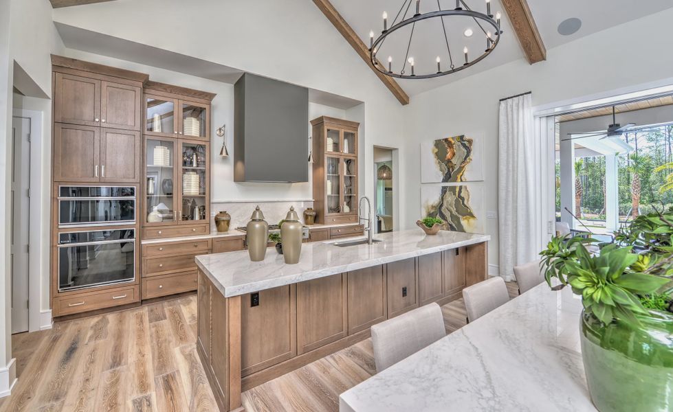 Furnished interior in a model home at Hidden Creek in St. Augustine (Image 4).