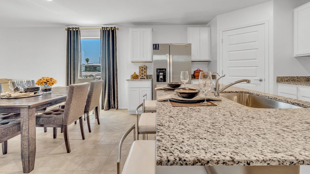 Furnished interior in a model home at Senita Crossing in Tucson (Image 20).