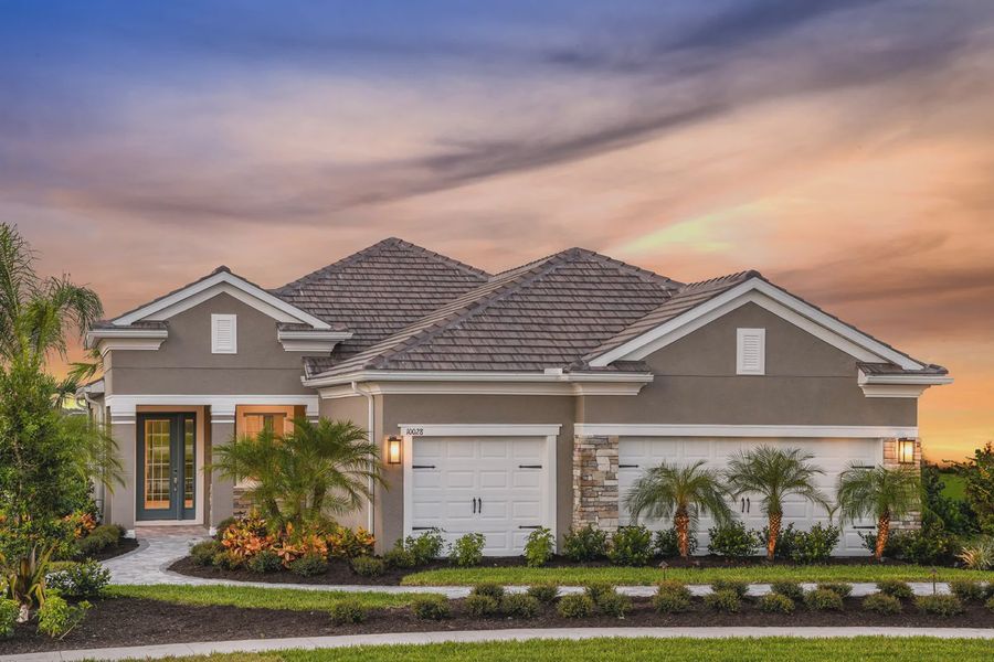 Front exterior of a home in the Grand Park community, located in Sarasota, FL (Image 4).