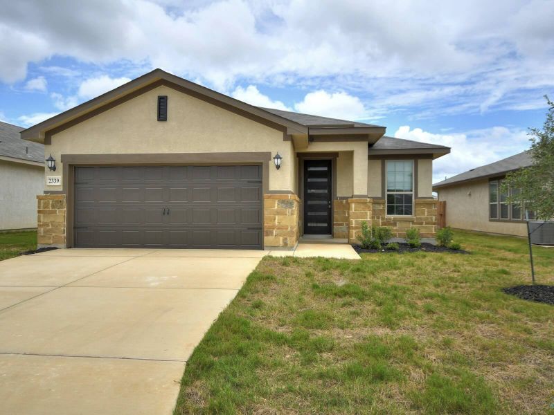 Front exterior of a home in the Sagebrooke - Premier Series community, located in San Antonio, TX (Image 2).