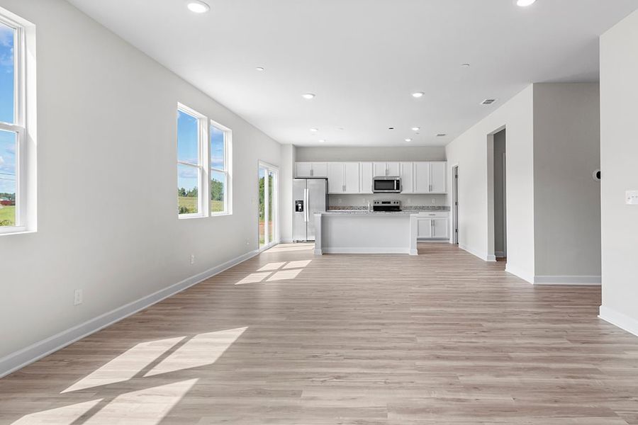 A large empty kitchen. A large empty kitchen.