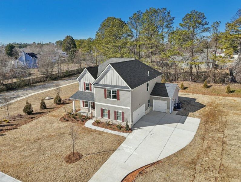 Front exterior of a home in the Stephen's Landing community, located in Loganville, GA (Image 6).
