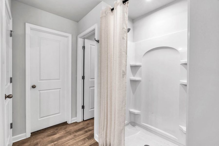 Furnished interior in a model home at The Reserve at Chapel Hill Phase II in Douglasville (Image 25).