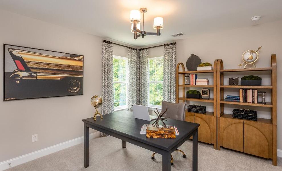 Furnished interior in a model home at Running Brook Townes in Durham (Image 13).