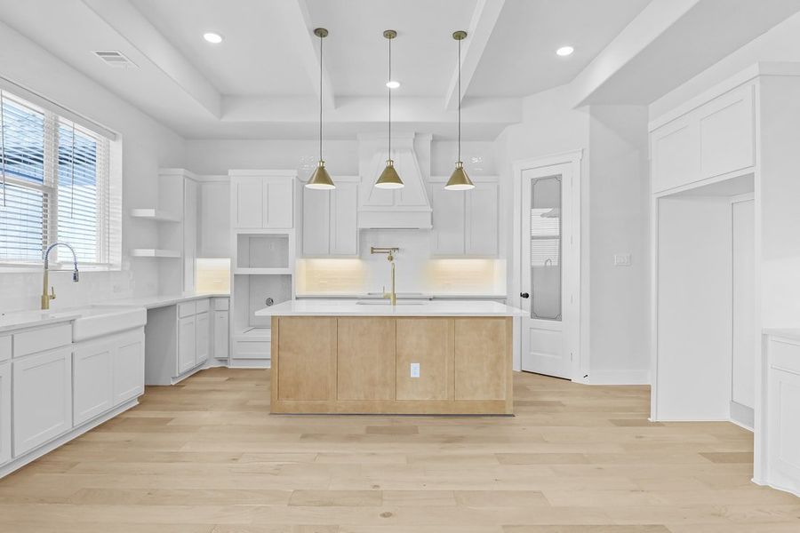 Furnished interior in a model home at Coppenger Place in Godley (Image 7).