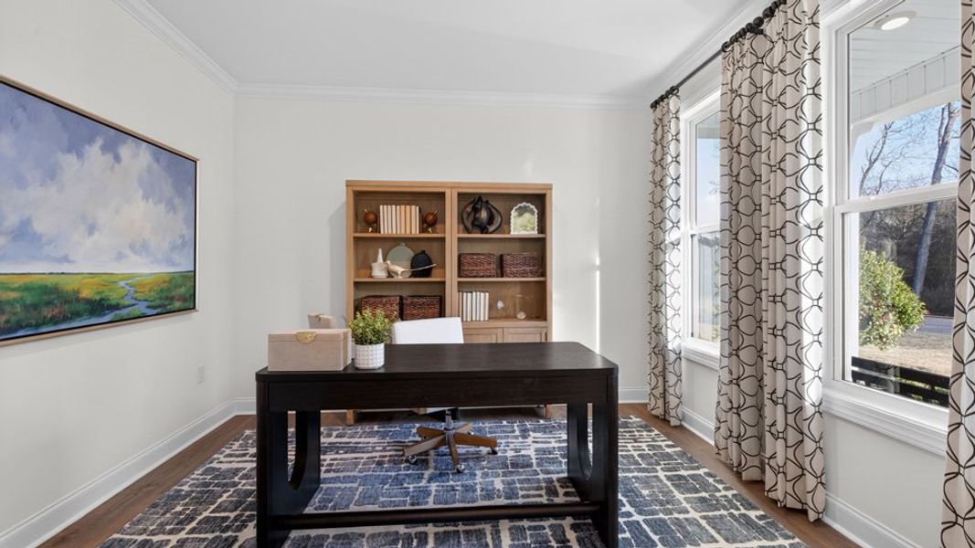 Furnished interior in a model home at The Grove at Winston Pointe in Clayton (Image 9).