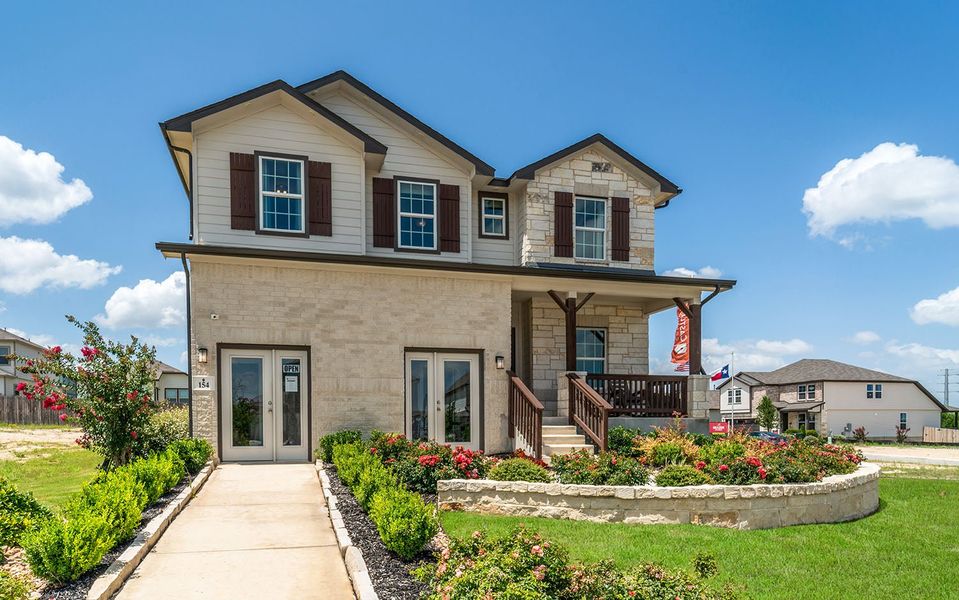 Front exterior of a home in the Hunter's Ranch community, located in San Antonio, TX (Image 10).