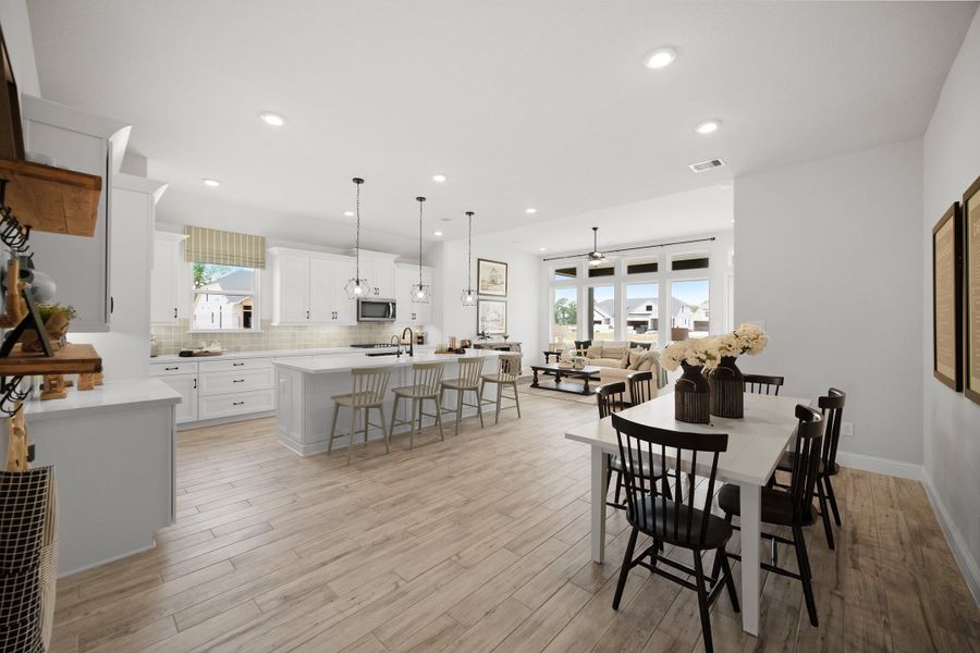 Furnished interior in a model home at Gatherings® at Chambers Creek in Willis (Image 9).