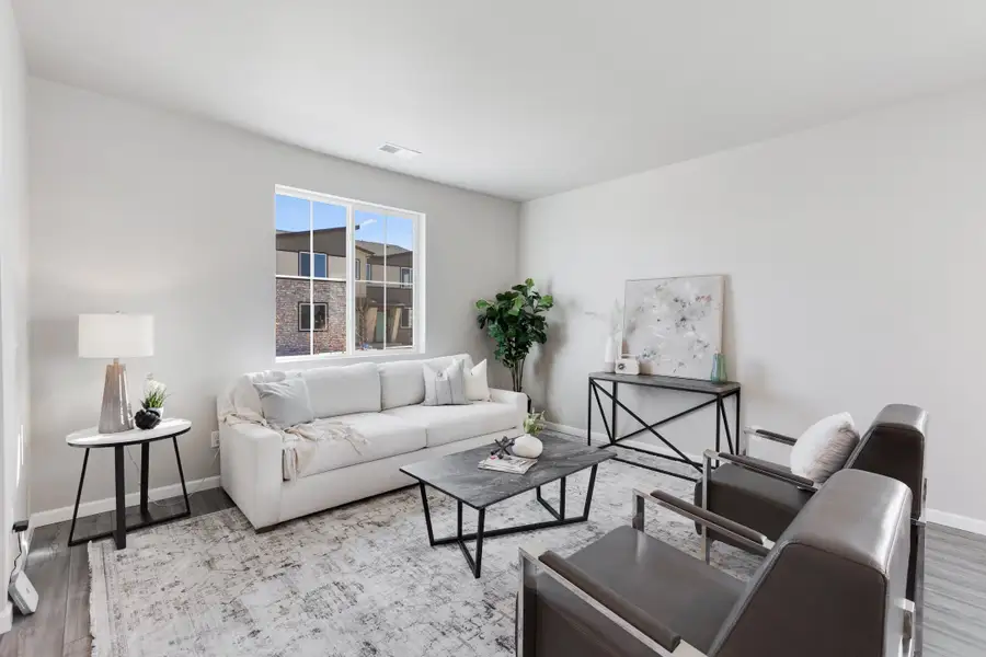 Furnished interior in a model home at Spring Valley in Longmont (Image 6).
